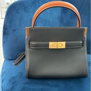 Tory Burch medium crossbody/tote.  Barely Used.  Great condition.